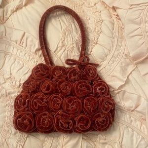 Velvet rosette handbag